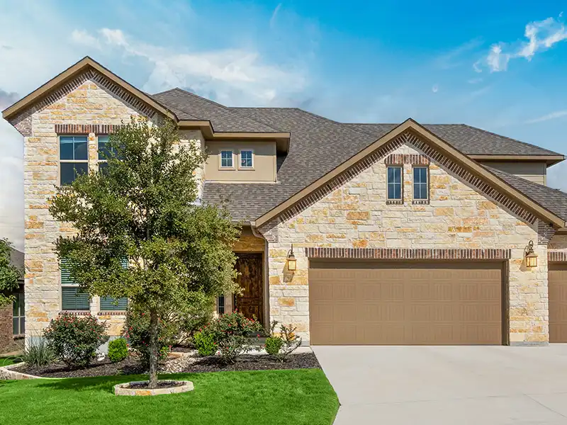 Home with a gray shingle roof